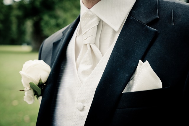 man wearing suit in close up photography