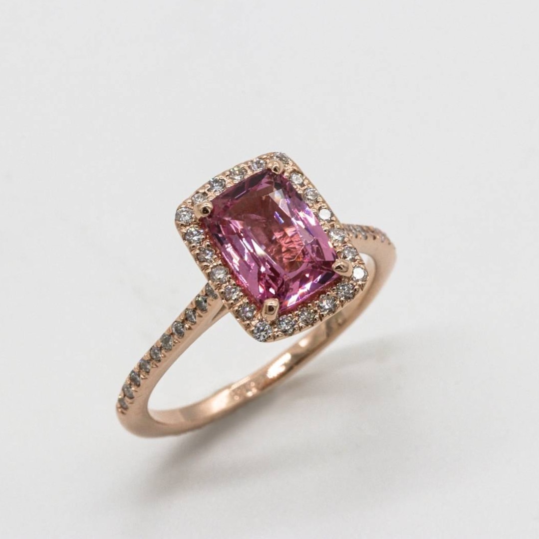 A Pink Sapphire Halo Pavé Ring